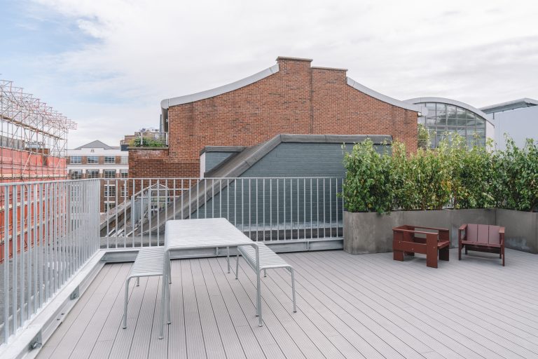 The galvanised steel balustrade made by Winthill Engineering is an attractive yet purposeful safety barrier, fitted to the edge of the roof top terrace at 11 - 12 Great Sutton Street