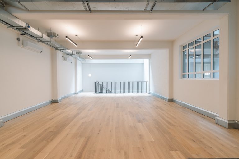 The upper floors at 11 - 12 Great Sutton Street are filled with light. The bespoke metal balustrade made by Winthill Engineering provides safe access and egress, and acts as a safety barrier between the office space and stairwell