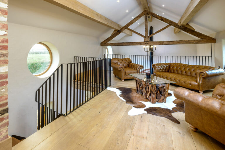 Custom steel balustrade designed by Winthill Engineering for unique party barn in Shropshire